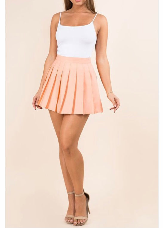 Wildcat Pleated Solid Colored Mini Skirt (Peach) S46613